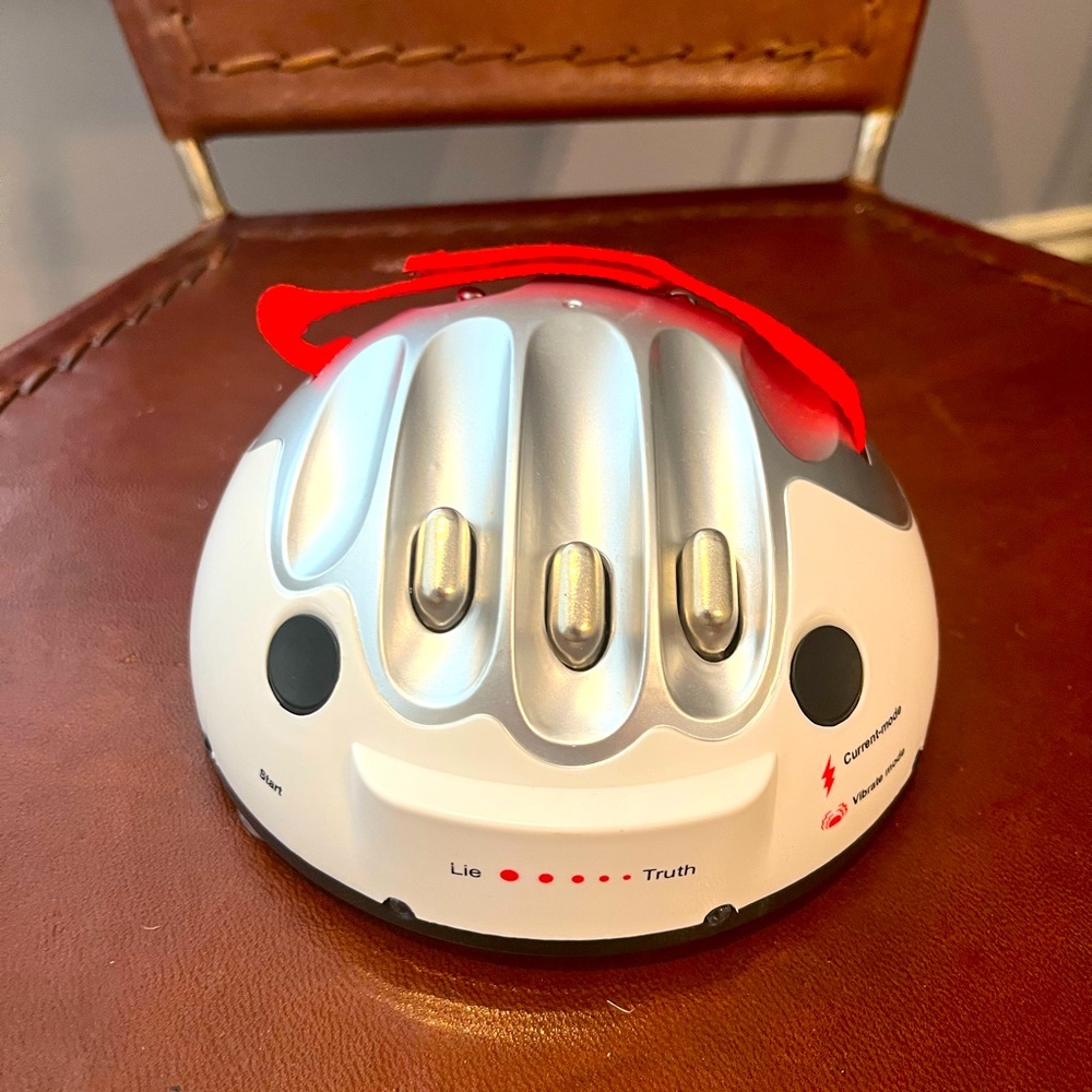 Electric shock lie detector game